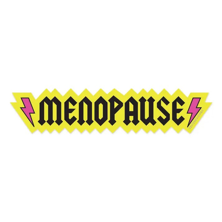 A spiky bright yellow sticker featuring the word "Menopause" written in a heavy metal inspired font with pink lightning bolts on either side.