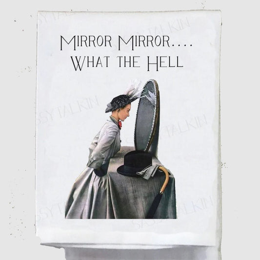 White towel with a vintage illustration of a woman looking into a mirror and the words "Mirror Mirror... what the hell"