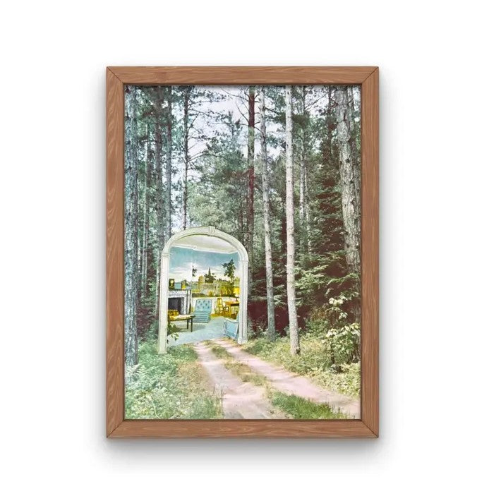 An 8x10 surrealist print of a forest path that ends abruptly in a large mirror that reflects a living room and city scape.