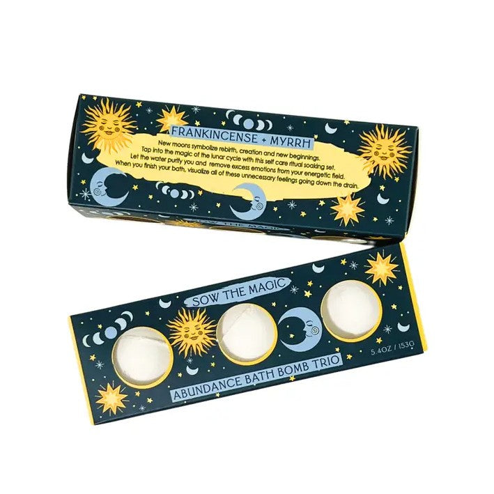 Bath bomb trio packaging with celestial design on a white background