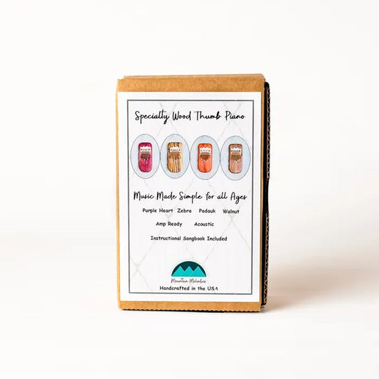 Wooden thumb piano packaging with product details on a white background