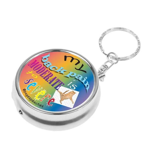Colorful pill container key chain with a photo of a cat and the words "My back pain is moderate to severe" on the front