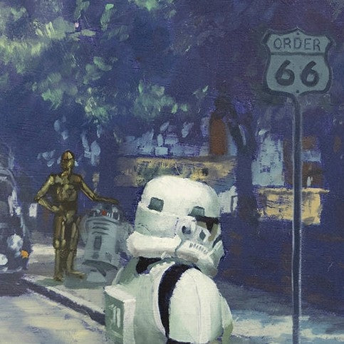 Closeup of a painted storm trooper in front of C3PO and R2D2.