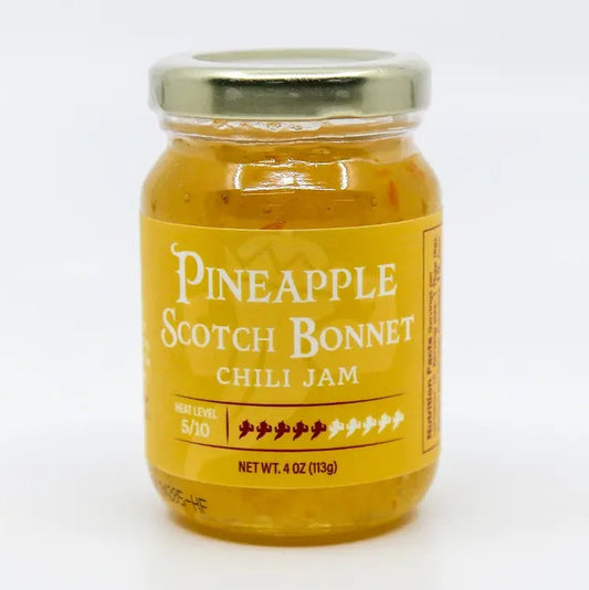 Four ounce jar of pineapple scotch bonnet chili jam
