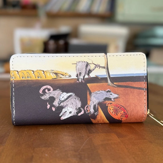 Wallet featuring an illustration of melting possums in the style of Salvador Dali