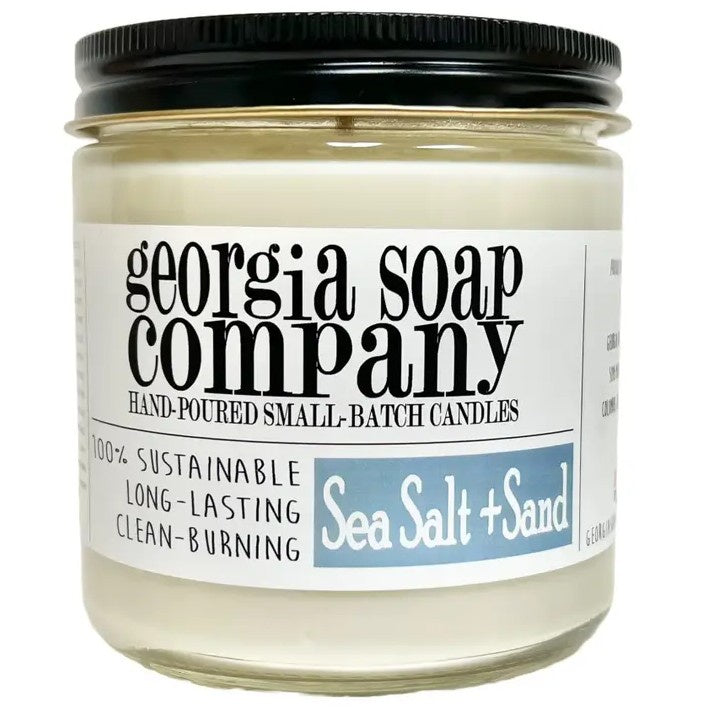 Sea salt and sand scented candle in a glass jar