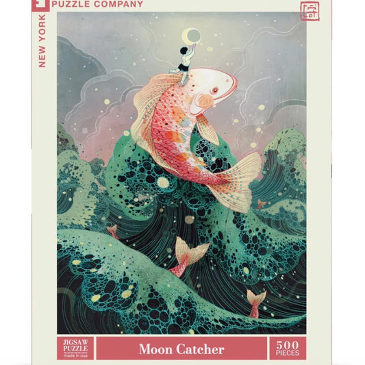 Five hundred piece puzzle depicting a little boy riding on the back of a giant pink koi fish and reaching for the moon