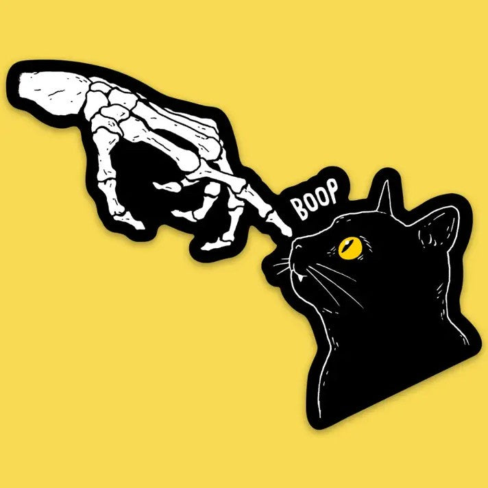 Sticker depicting a skeletal hand booping a black cat on the nose