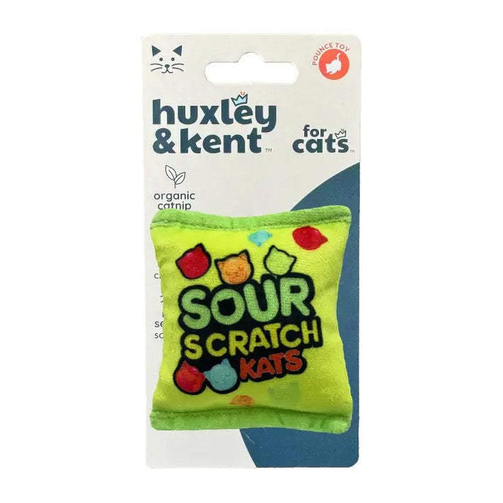 Green catnip toy shaped like a candy bag with text "Sour Scratch Kats"