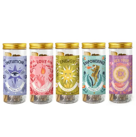 Set of five ritual kits in jars with colorful labels 