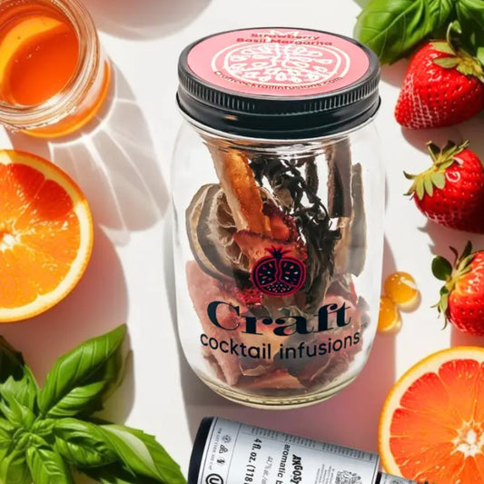 Glass jar with cocktail ingredients for a strawberry basil margarita