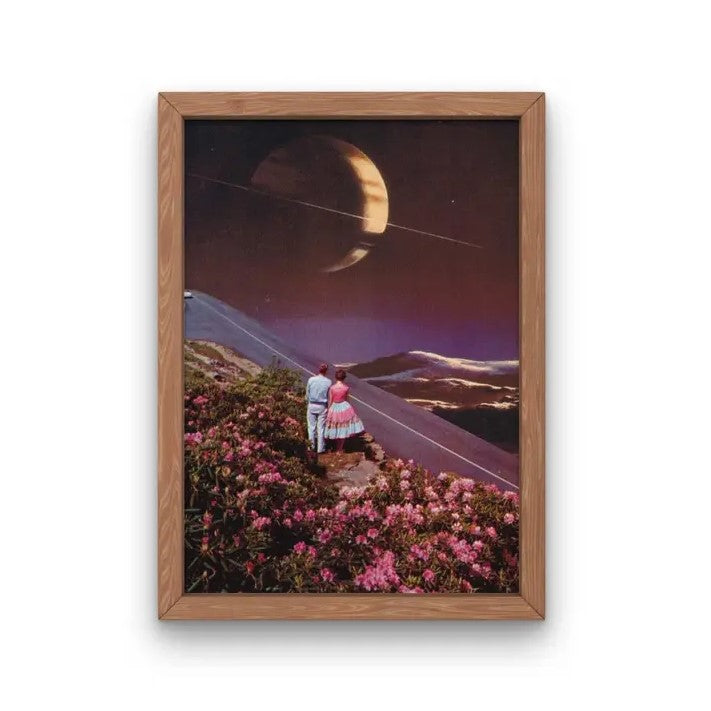 An 8x10 surrealist art print of a couple standing by the highway at night, surrounded by pink flowers, looking up at a very large moon.