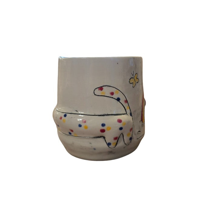 White ceramic cup with a long polka dotted wiener dog on it 