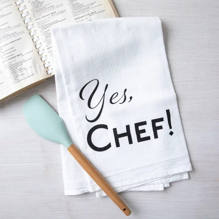 White kitchen towel with the words "Yes, Chef!"