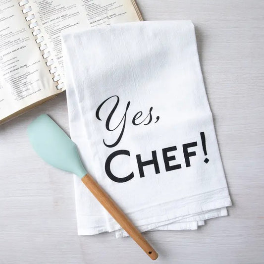 White kitchen towel with the words "Yes, Chef!"