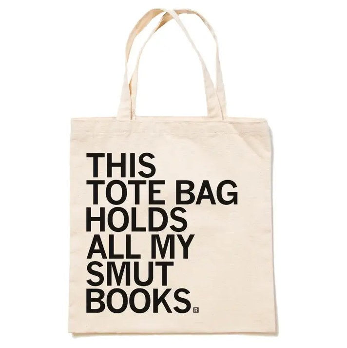 Beige tote bag with black text that reads "This tote bag holds all my smut books"