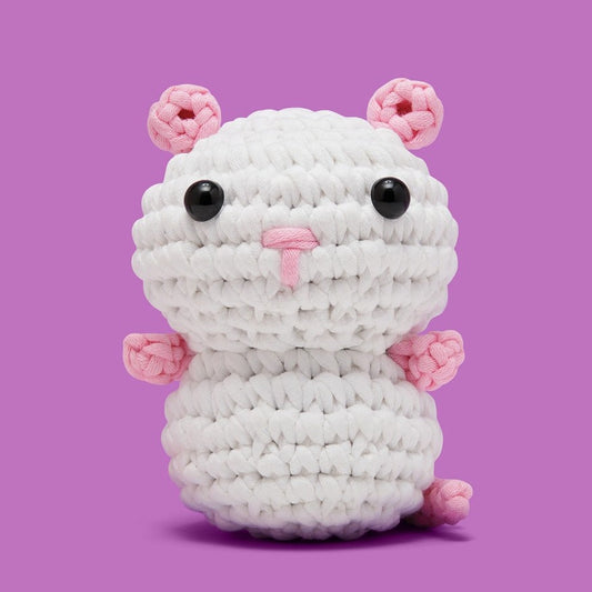 White and pink crochet rat plush