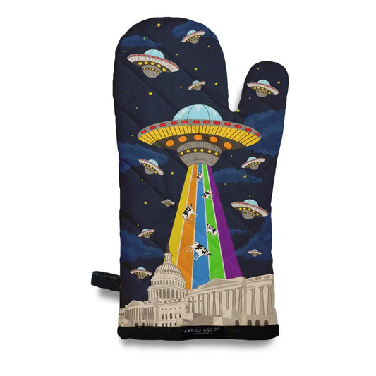 Oven mitt featuring a design of a UFO with a rainbow colored tractor beam and several cows being abducted