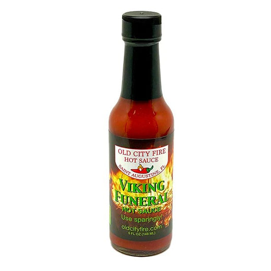 Five fluid ounce bottle of Viking Funeral hot sauce with flames on the label