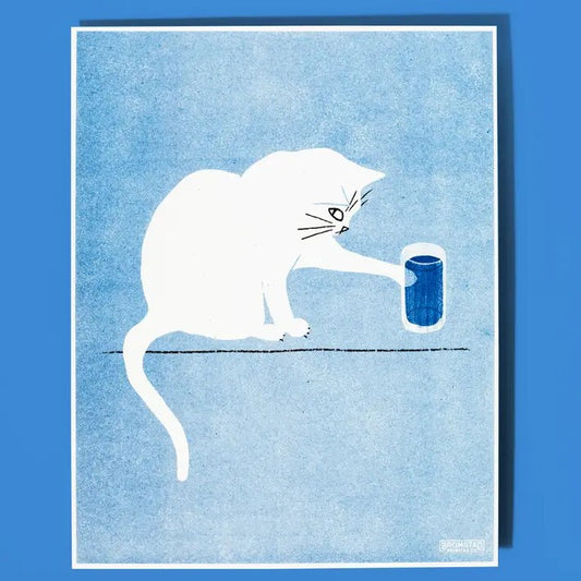 Blue risograph print of a white cat looking up mischievously as it is about to knock over a glass of water