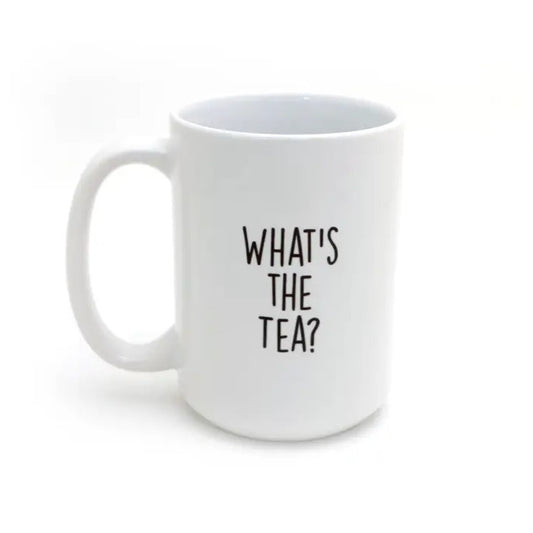 White mug that reads "What's the tea?" in black lettering