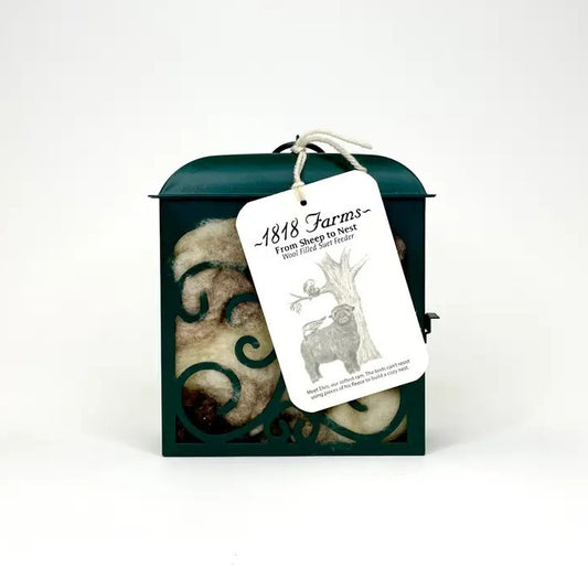 Bird feeder filled with sheep's wool