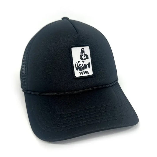 Black ball cap with a patch featuring one panda hitting another with a folding chair, captioned "WWF"