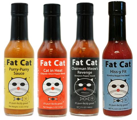 various flavors of hot sauce that are all cat themed