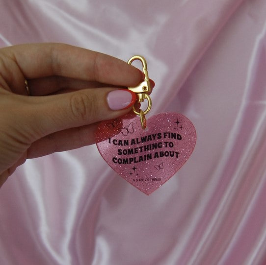 See-thru glittery keychain shaped like a heart