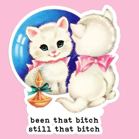 Sticker with the quote "been that bitch, still that bitch" with a cat looking at itself in the mirror