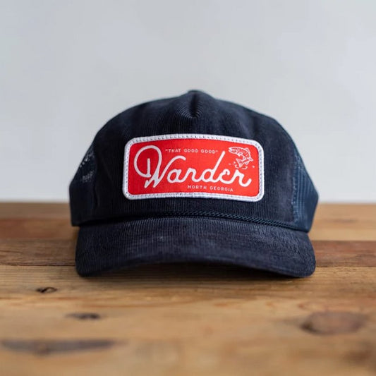 Suede hat with embroidered red patch that says Wander North Georgia "That good good" and a little fish in white on the patch