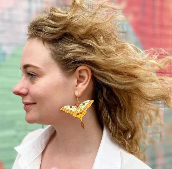 wood colorful moth earrings on model