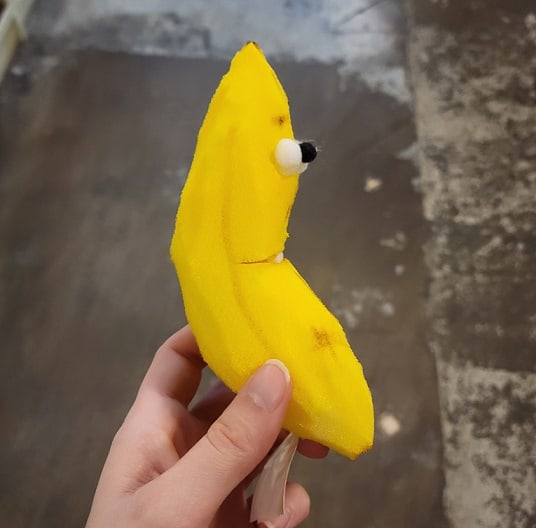 side view of banana puppet