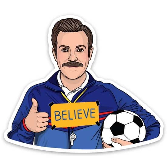 ted lasso holding a soccer ball with a thumbs up sticker