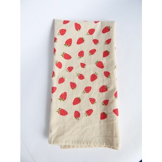 strawberries across a kitchen towel